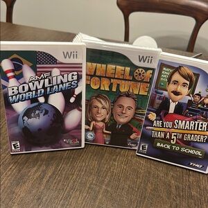 Wii Game Trio: Bowling, Wheel of Fortune, 5th Grader- Wheel Game is sealed
